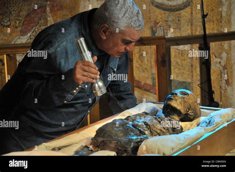 Zahi Hawass Examining King Tut Mummy Inside The Tomb Of