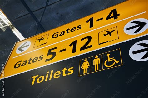 toilets  gate signs   airport terminal stock photo adobe stock