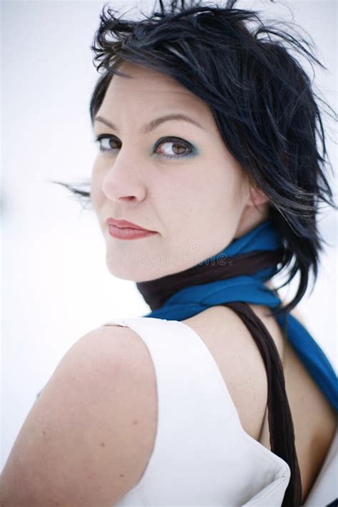 woman wearing  stylish dress scarf  ice skate stock photo image