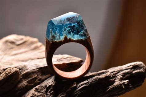 beautiful wooden rings with mini landscapes encapsulated