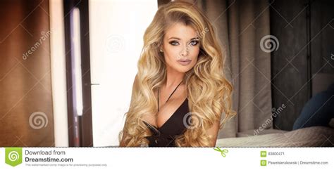 blonde woman in hotel room stock image image of elegant