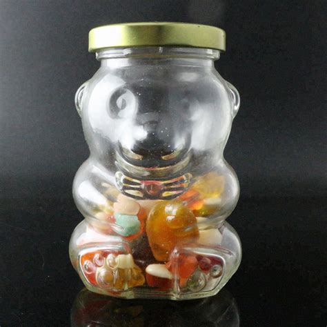 china  oz honey bear shaped glass jar glass bottle  black white gold metal lid manufacturer