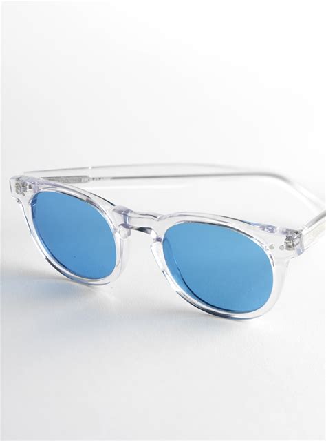 semi round sunglasses in clear with blue lenses the ben silver collection