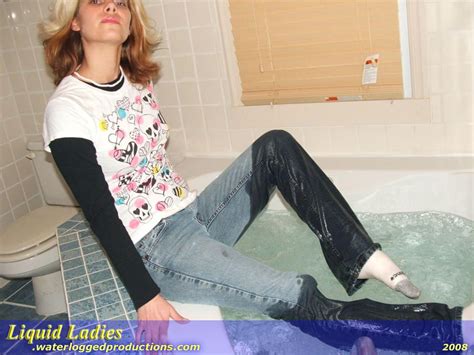 aurelia in her first shoot with liquid ladies tries out the hot tub wearing a purple long