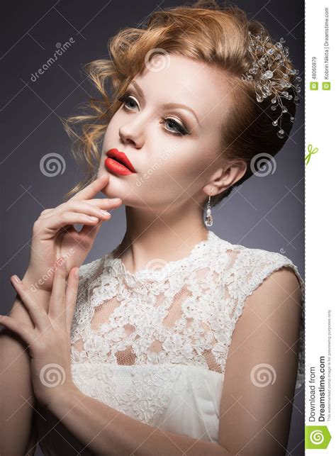 portrait of a beautiful ginger woman with red lips in the