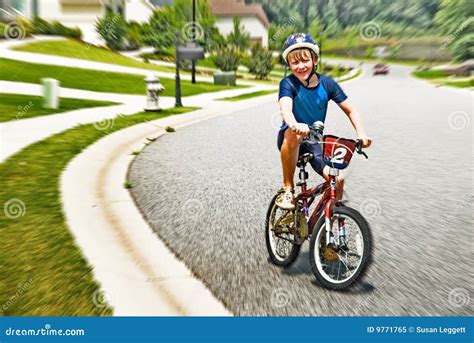 boy riding bike  neighborhood stock image image