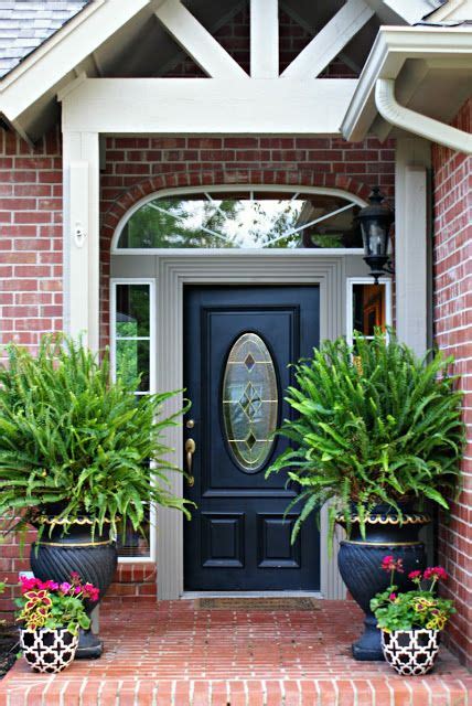 kimberly queen ferns black urns front porch garden pinterest planters blue doors and ferns