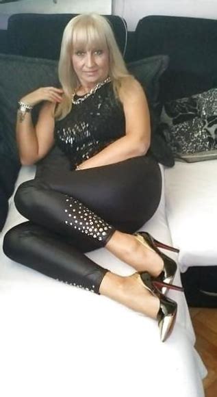 hot granny in shiny leggings and high heels for the