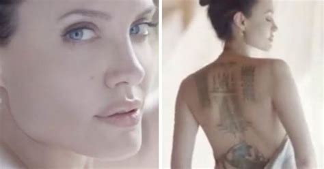 angelina jolie strips topless and writhes in bed for