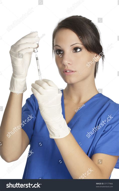 Beautiful Caucasian Doctor Nurse Hypodermic Syringe Stock