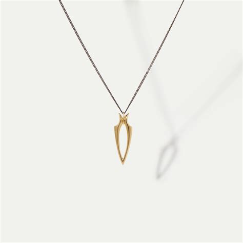 stretched spur yellow gold pendant hannah martin