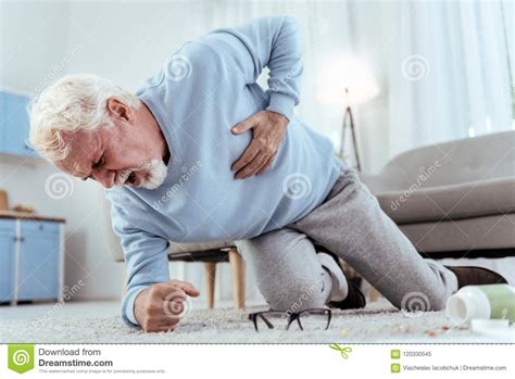 painful senior man needing medical  stock image image  diversity rehabilitation