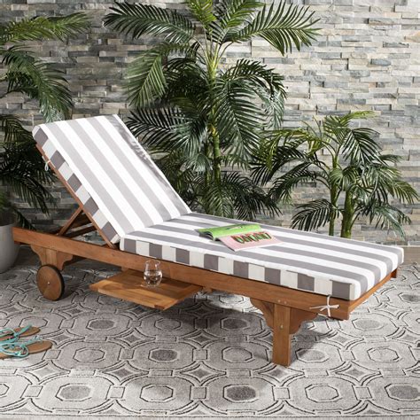 newport chaise lounge chair with grey and white cushion and side table in