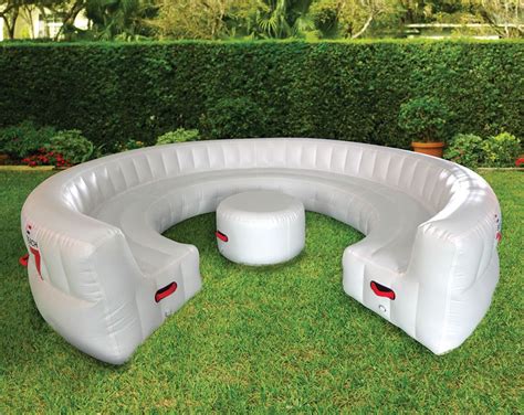 massive inflatable outdoor party sofa seats  guests  green head
