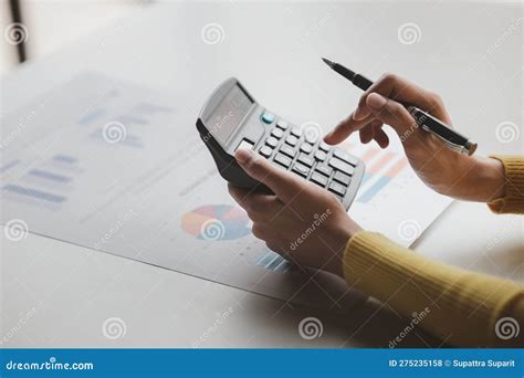 businessman   calculator  calculate numbers   company  financial documents stock
