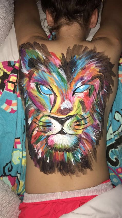 person   tattoo       lion face painted