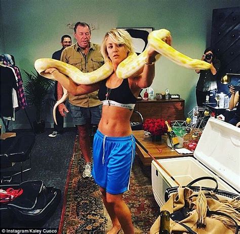 kaley cuoco slithers with python during britney spears lip