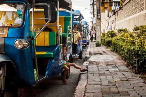 girl in a tuk tuk imb