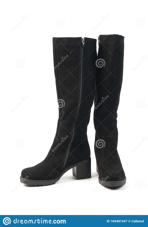 elegant women`s tall black winter high heeled boots isolated on white