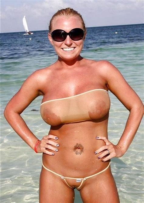 fit mature blonde woman in tiny string bikini free porn pics