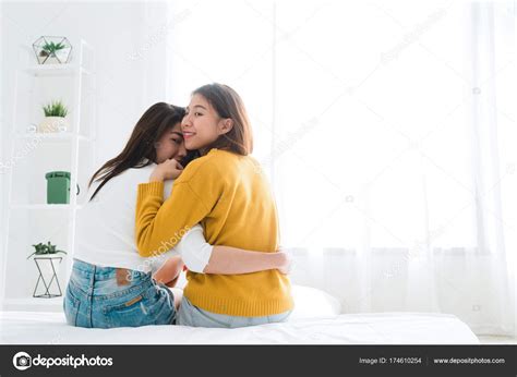 Back View Of Women Lesbian Happy Couple Waking Up In