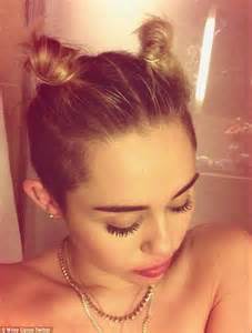 miley cyrus poses with no make up and damp hair in another shower selfie daily mail online