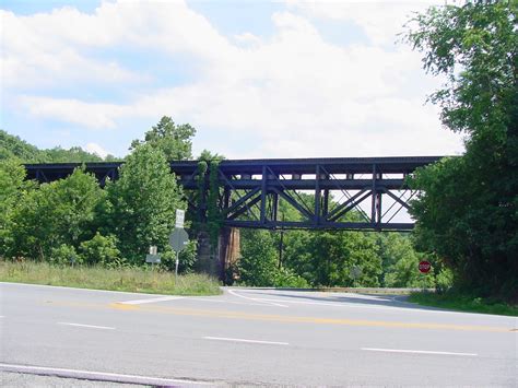 photo railroad bridge  highway  mechums river