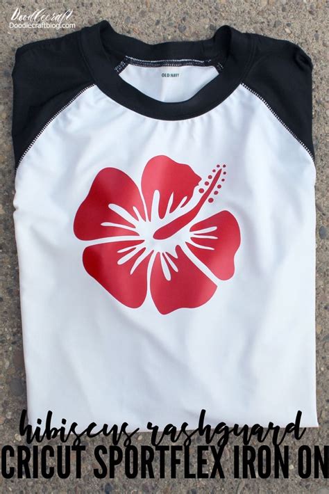 red hibiscus flower on black and white swim shirt made with cricut