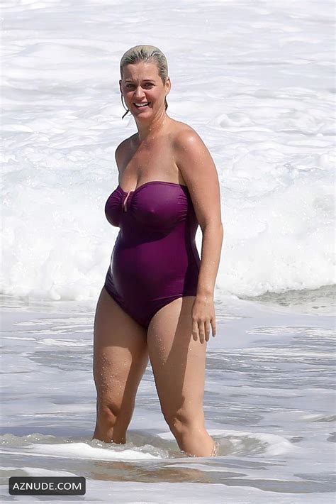 katy perry sexy shows off her boobs and butt in a swimsuit on the beach