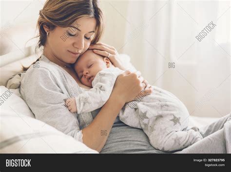 loving mom carying  image photo  trial bigstock