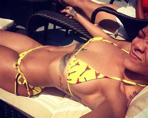 rihanna posts new bikini selfie sunbathing on european