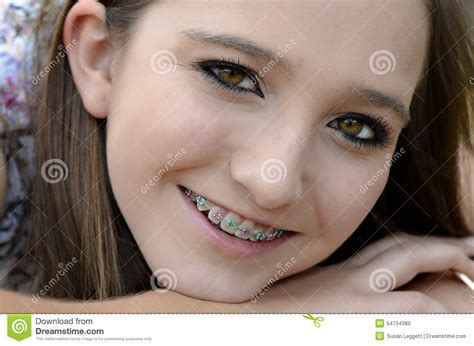 pretty teen with braces stock image image of cute confident 54754389