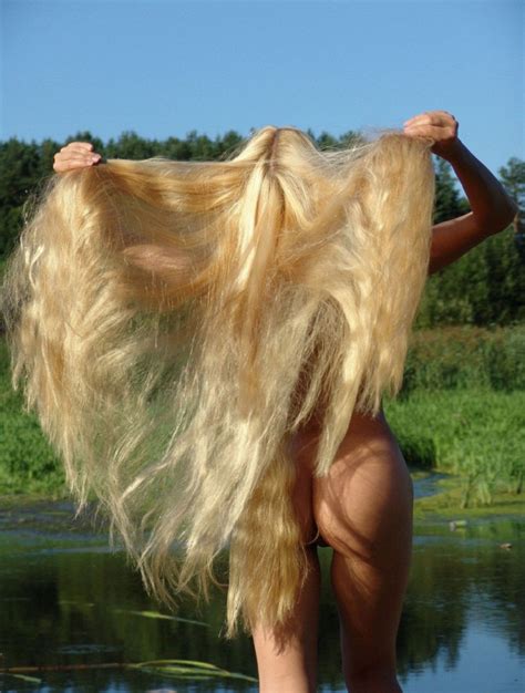 sporty blonde with really long hair at the lake russian sexy girls