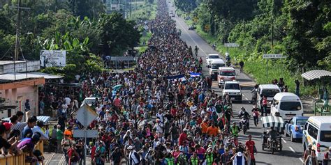 caravan heads north after migrants cross into mexico wsj