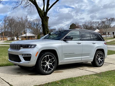 test drive  jeep grand cherokee summit reserve climbs  luxurious heights