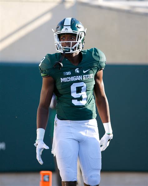 michigan state football players charged  sexual assault