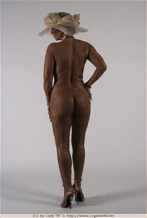 tanned naked milf shows her impressive naked body