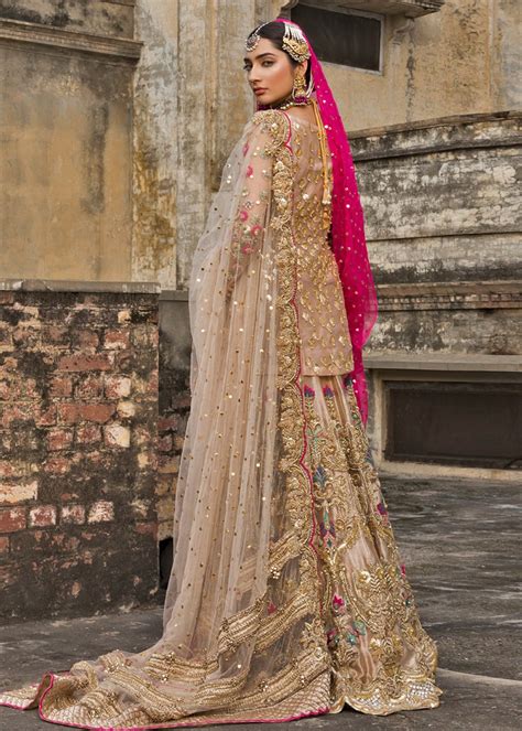 latest bridal lehnga dress  wedding wear  pink gold color    pakistani