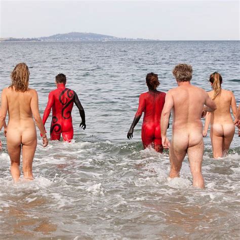 nude swimmers enter hobart s river derwent to promote dark