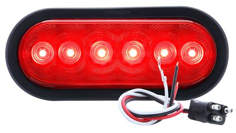 optronics  led stopturntail light kit red   oval tail light  grommet  plug