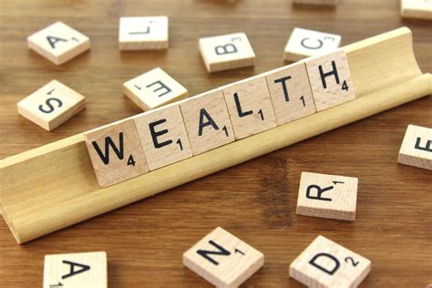 wealth   charge creative commons wooden tile image