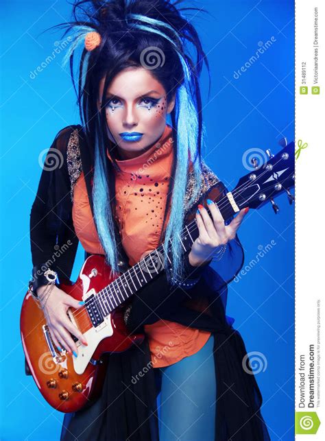 Rock Girl Posing With Electric Guitar Playing Hard Rock