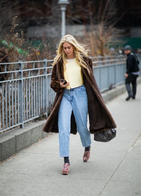 Winter Outfit Idea A Furry Coat Over Mom Jeans The Best Street Style