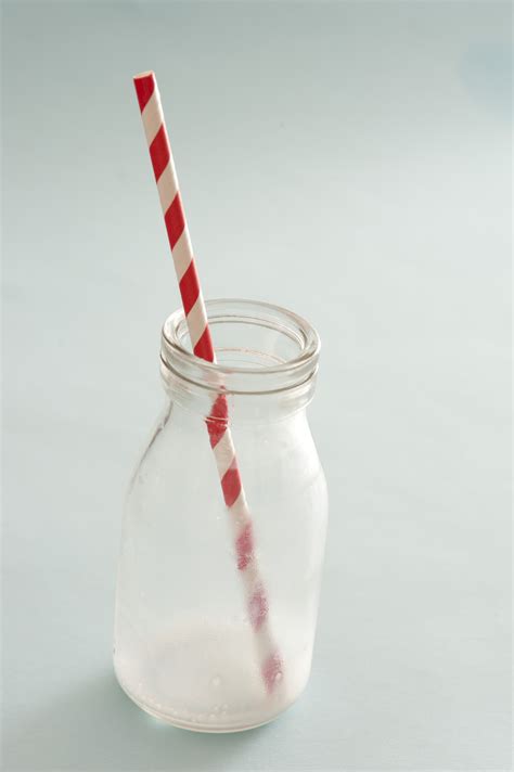 empty  glass milk bottle  straw  stockarch  stock photo archive