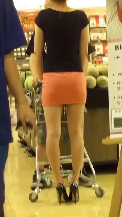 cute asian girl wears sexy short skirt and high heels at the super market feet9