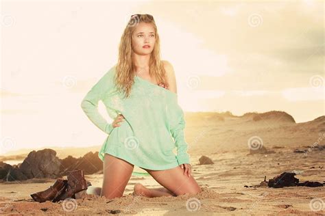 Blonde On Her Knees Green Jersey Stock Image Image Of Sunset Holiday