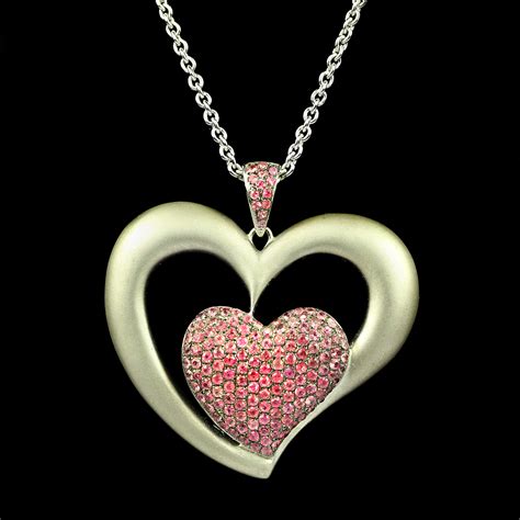 pink sapphire pendant heart shaped necklace house  kahn estate jewelers