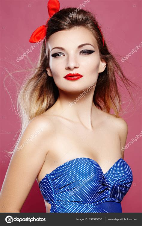 Sexy American Style Pinup Girl In Fashion Swimsuit With Dots Print And