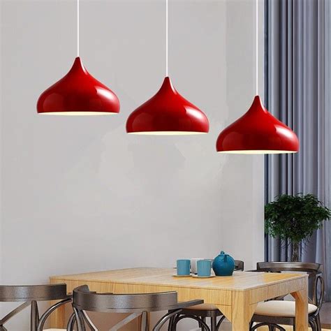 red pendant lights  kitchen   offering ample illumination    bring