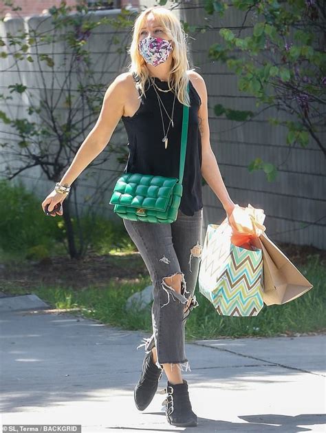 Malin Akerman Shows Off Her Sculpted Arms In A Tank Top As She Adds